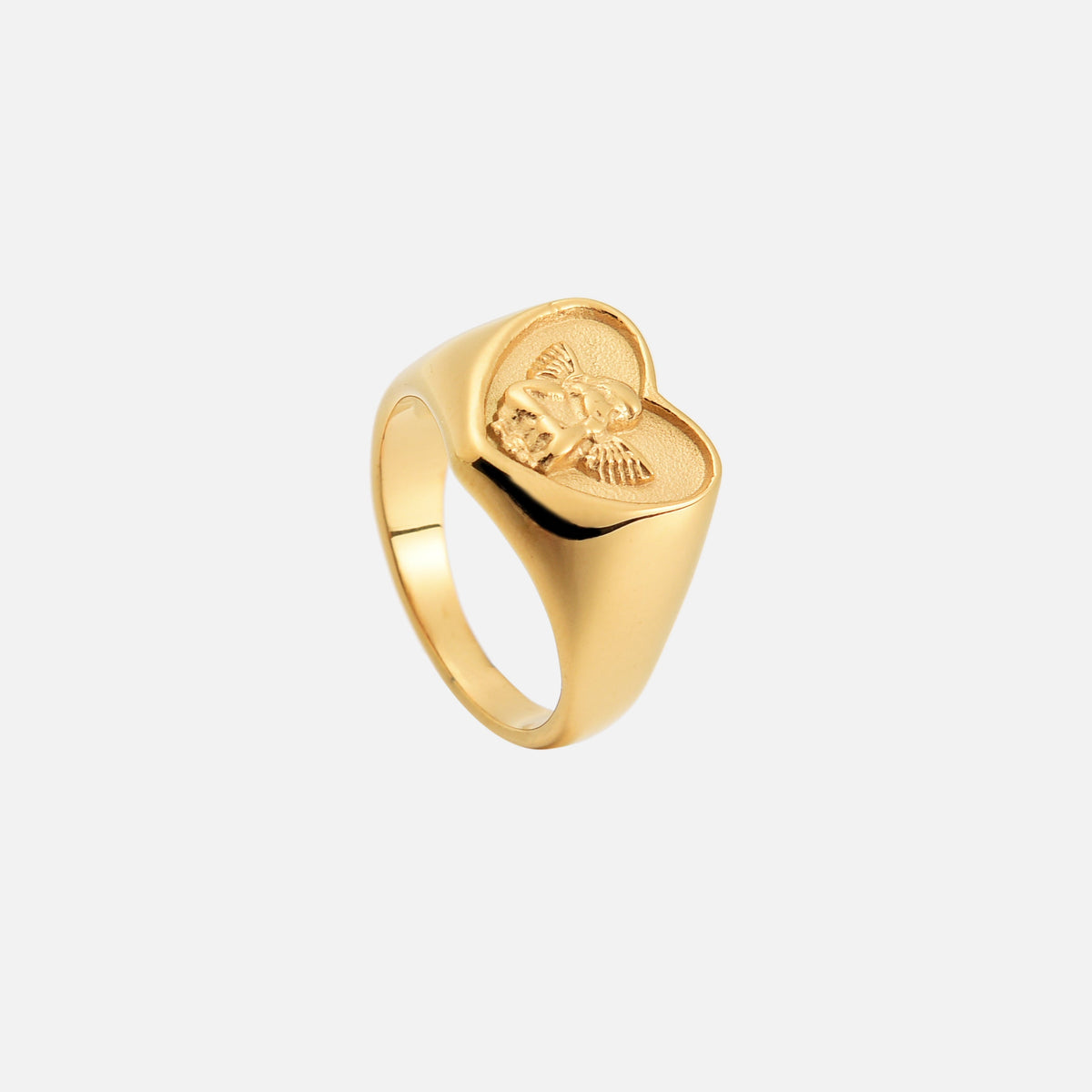 Heart-shaped gold-tone ring seen from above and the side, showing the cherub relief and smooth band 2