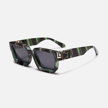 Square sunglasses with green and black marbled frames, grey lenses and gold-coloured hinge trim, three-quarter view. 14