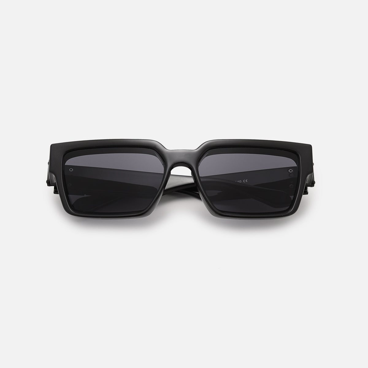 Black square-framed sunglasses with dark grey lenses, folded and laid flat, seen from the front. 2