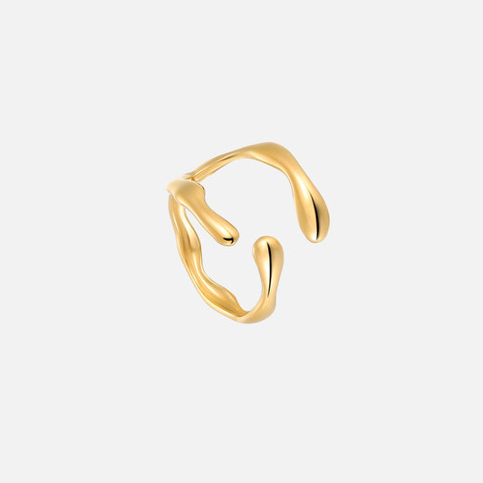 Gold-tone open ring with a flowing, wavy band and rounded drop-shaped ends, shown at an angle on a plain light background. 1