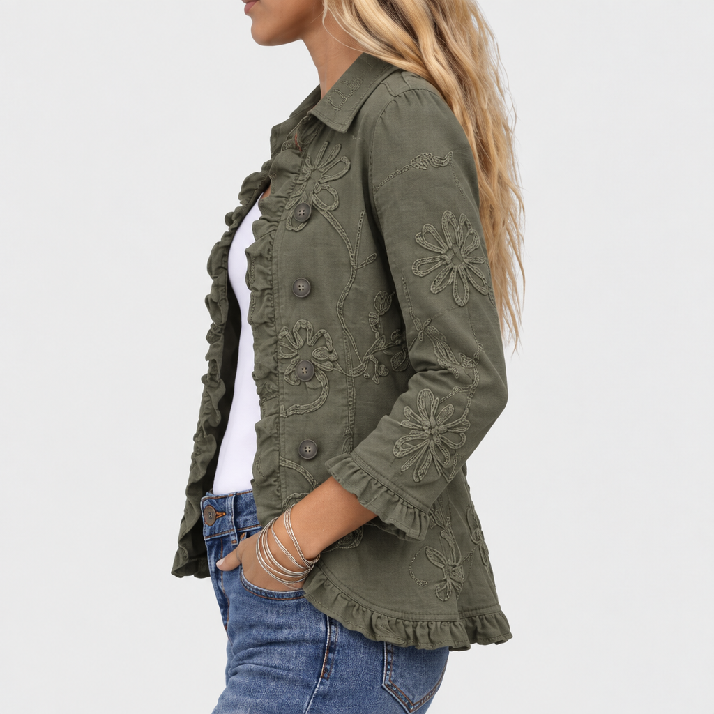 Side view of the jacket showing floral embroidery on the sleeve and ruffled hem and cuff 4