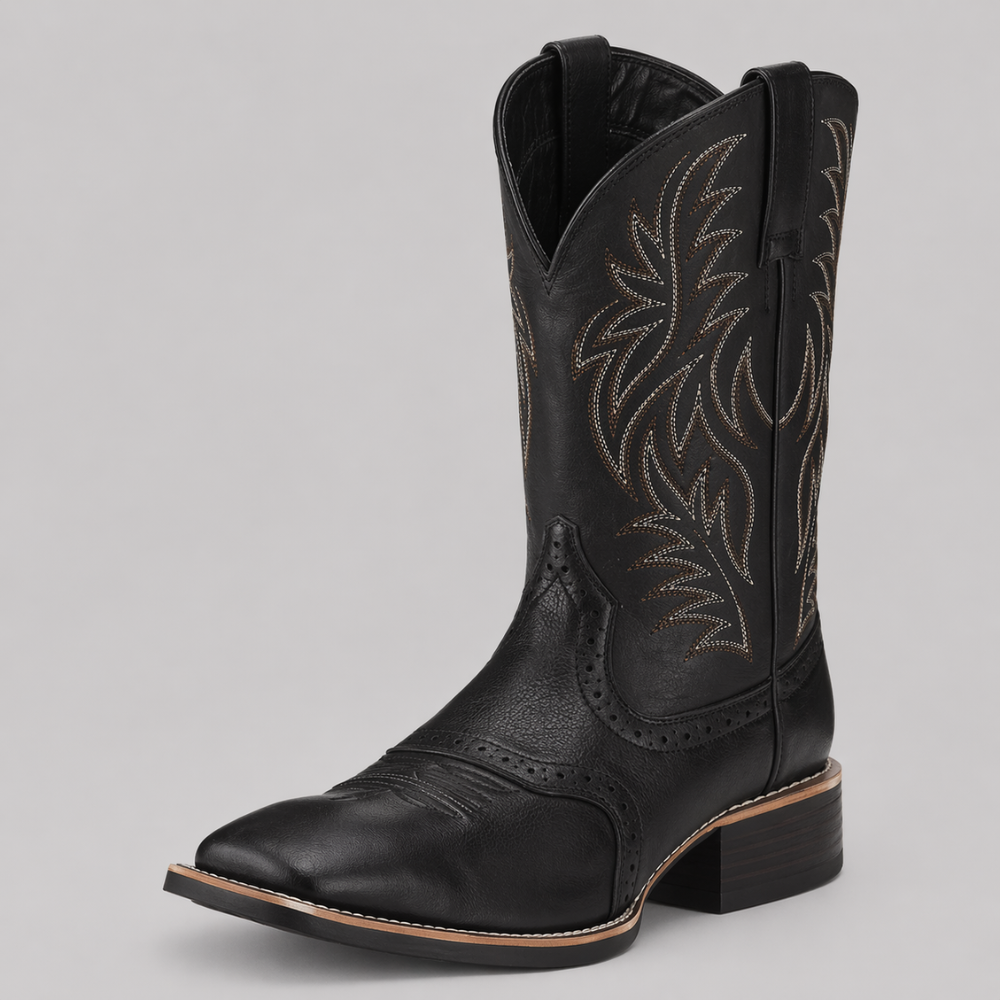 Black leather cowboy boot seen from the front and side, with contrast feather-pattern stitching on the shaft 1