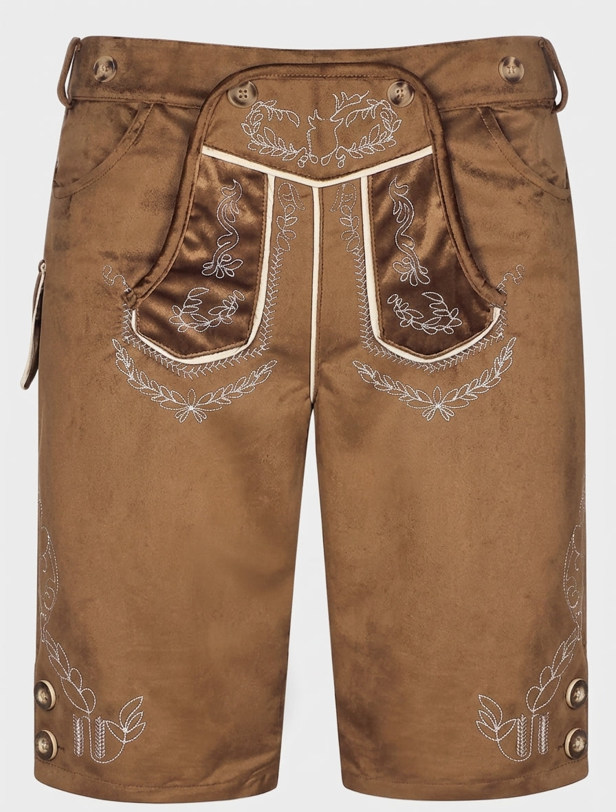 Brown breeches from the front with the flap lowered, revealing darker pocket panels and cream-trimmed embroidery 5