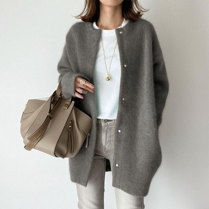 Model wears the same snap-button cardigan in mid grey, styled with a white tee and grey jeans 6
