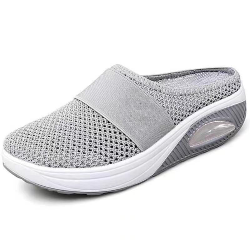 Light grey mesh backless slip-on with elastic strap and clear air cushion window in the sole 9