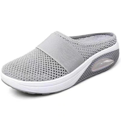 Light grey mesh backless slip-on with elastic strap and clear air cushion window in the sole 9