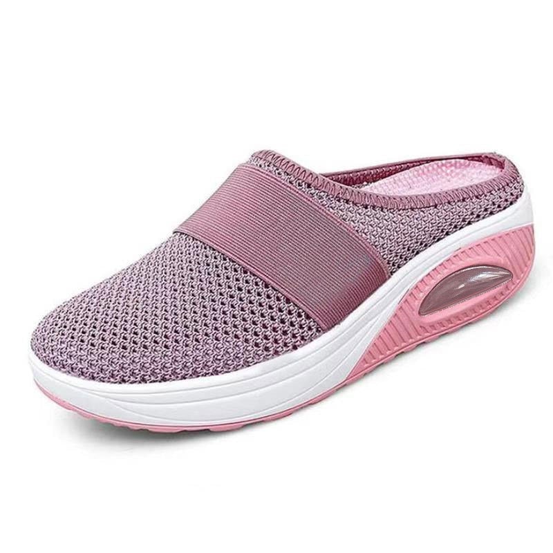 Pink and mauve mesh backless slip-on with white midsole, pink outsole and air cushion window 12