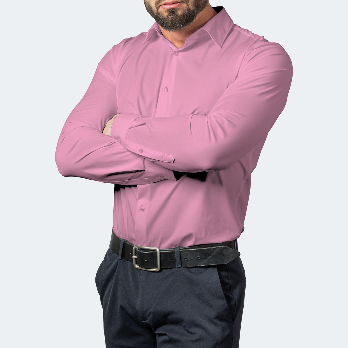 Pink shirt on a model with arms crossed, showing the cuffs and buttoned placket 8