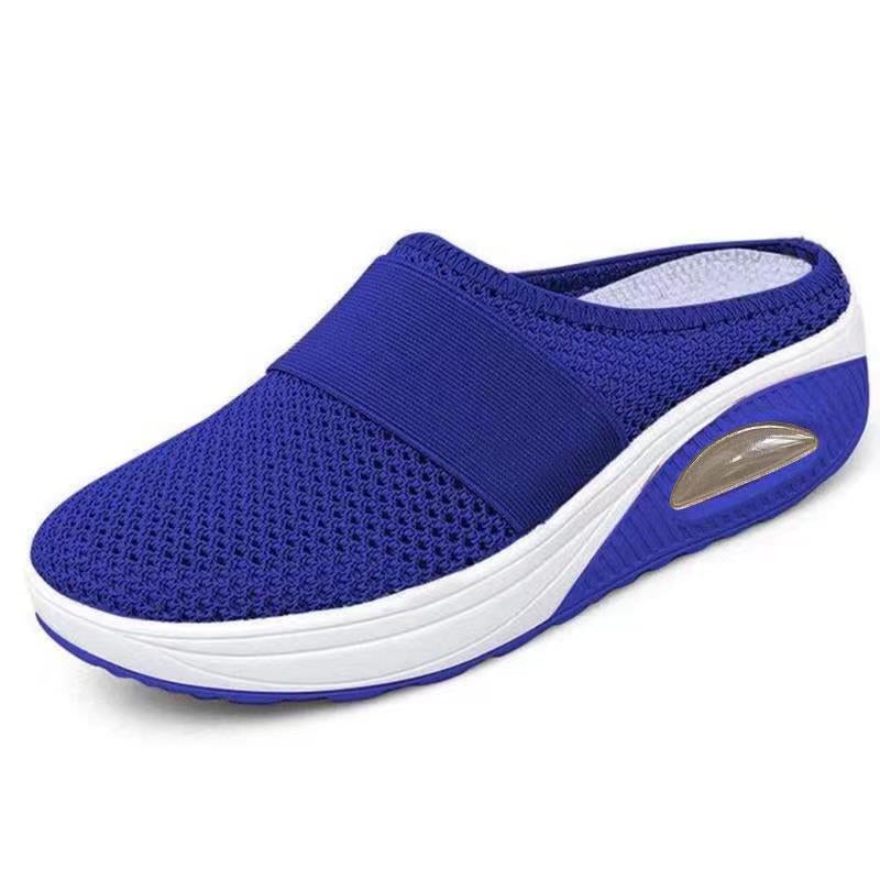 Bright blue mesh backless slip-on with white midsole and visible air cushion window 11
