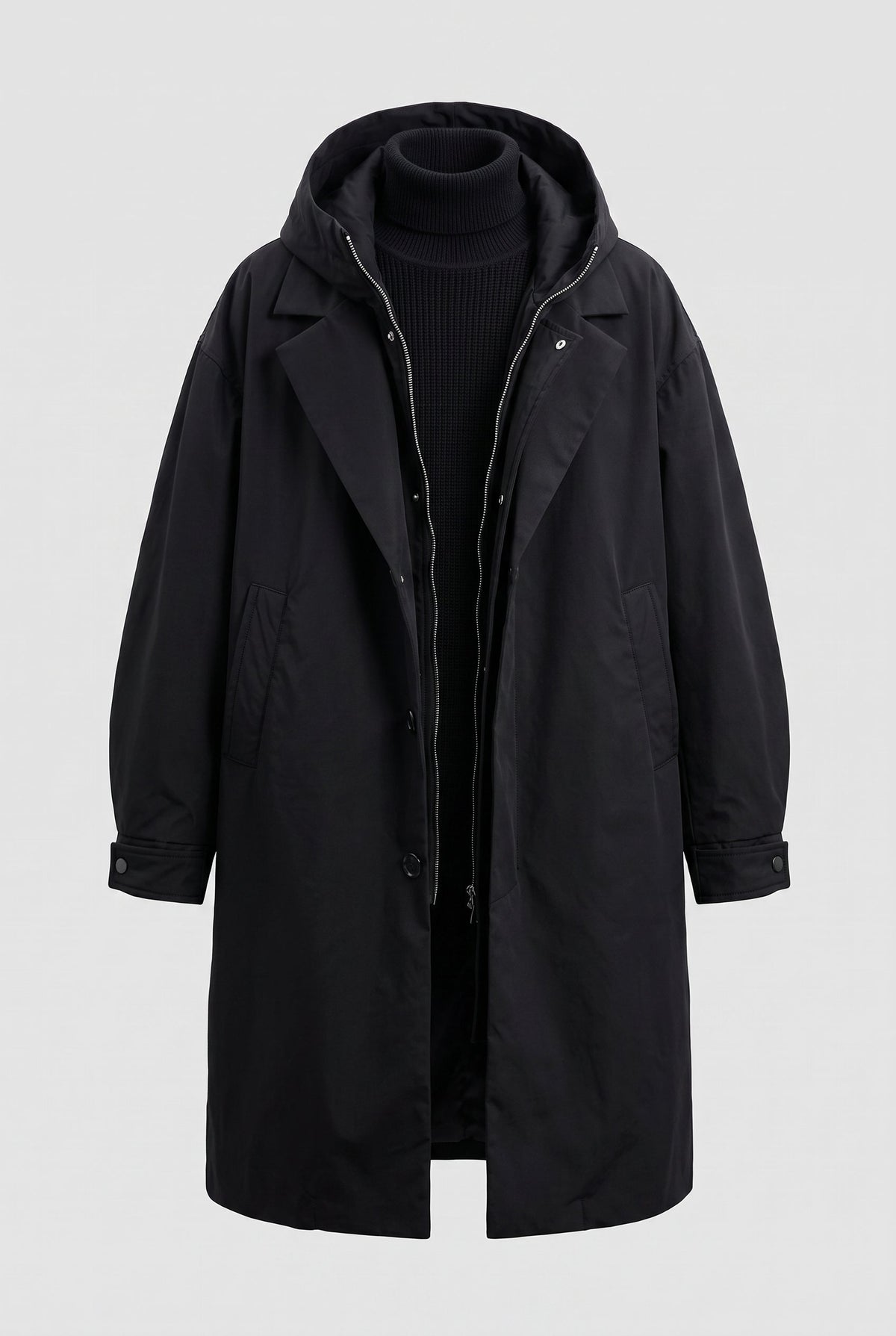 Black hooded coat laid out flat on a plain background, open to show zip, buttons and pockets 8