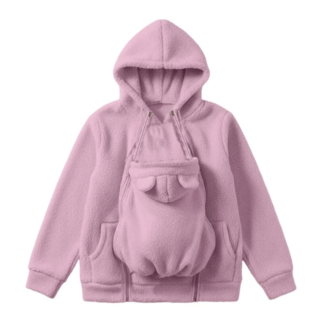 Flat lay of the pink fleece hoodie with the zipped baby pouch and bear-ear hood panel fitted in front. 1