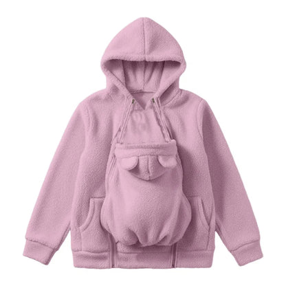 Flat lay of the pink fleece hoodie with the zipped baby pouch and bear-ear hood panel fitted in front. 1