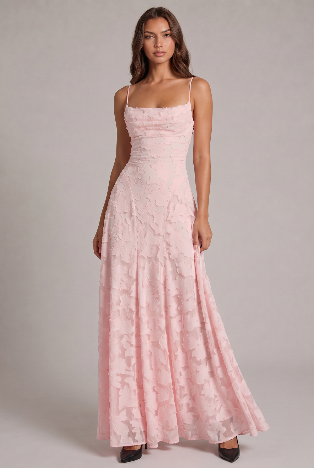 Model wearing the pale pink floral-textured maxi dress with thin straps, full-length front view with black heels. 5