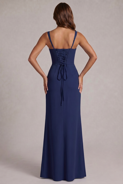 Back of the navy maxi dress, showing the corset-style lace-up back, tied ribbons and thin adjustable straps. 4