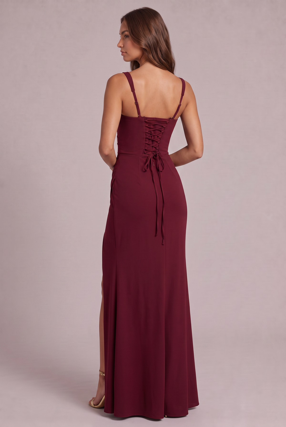 Back view of the burgundy maxi dress, showing the corset lace-up closure, trailing ties and adjustable thin straps. 12