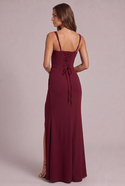 Back view of the burgundy maxi dress, showing the corset lace-up closure, trailing ties and adjustable thin straps. 12