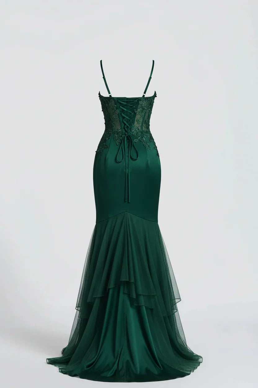 Back view of a dark green mermaid gown with lace-up corset back and tiered tulle skirt 5