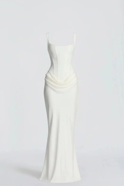Ivory corset-style maxi dress with wide straps and a draped hip panel, shown on a mannequin 1