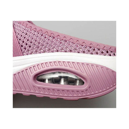Close-up of the pink ribbed sole with transparent air cushion window and zigzag stitching on the mesh upper 13