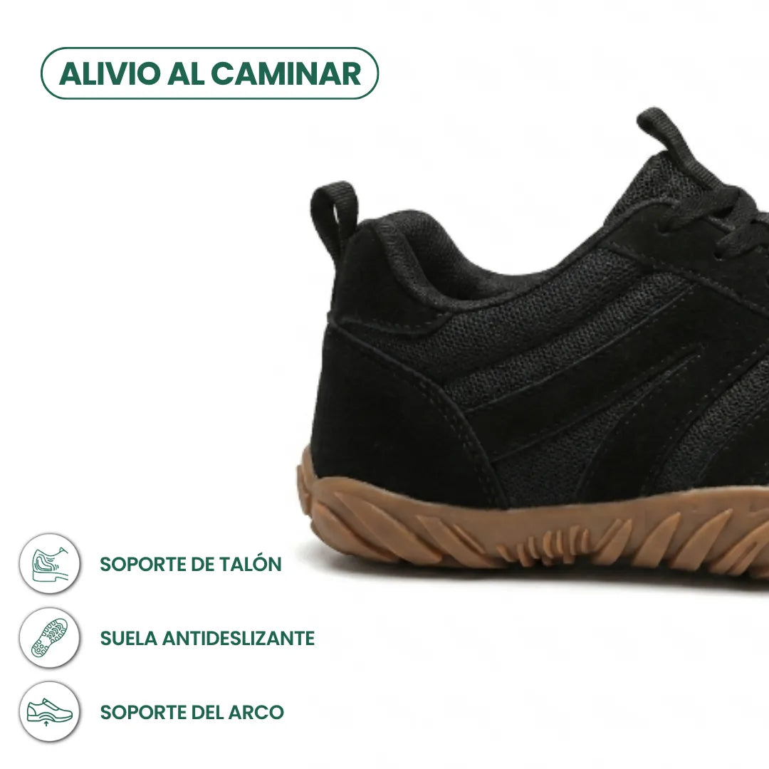 Close-up of the heel of the black mesh and suede shoe with a tan sole, with icons for heel, grip and arch support. 22