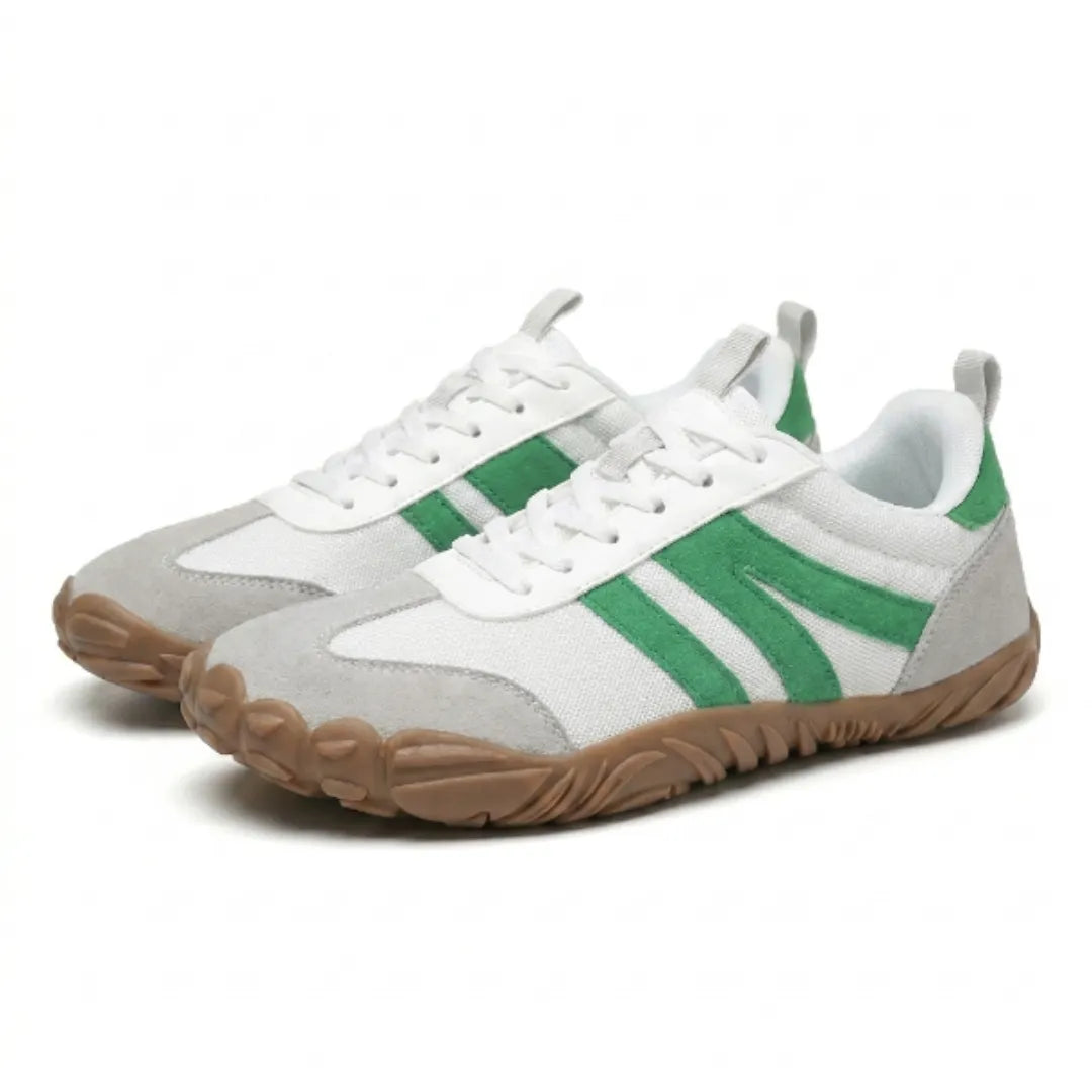 Pair of white lace-up shoes with green suede stripes, grey toe caps and a tan sole, shown from the front at an angle. 34