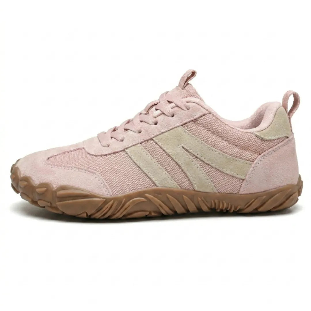 Side view of the pink version in mesh and suede, with beige stripes, matching laces and a tan sole. 10