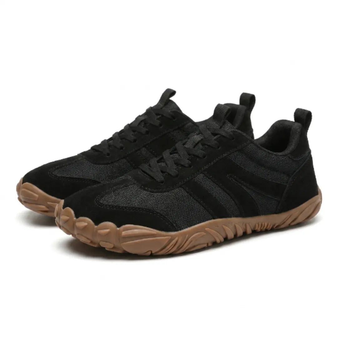 Pair of black lace-up shoes with mesh panels, suede stripes and a chunky tan sole, shown from the front at an angle. 25