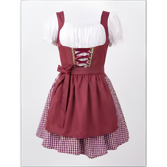 Front view of the burgundy dirndl on a mannequin, with white blouse, lace-up bodice and gingham skirt 1