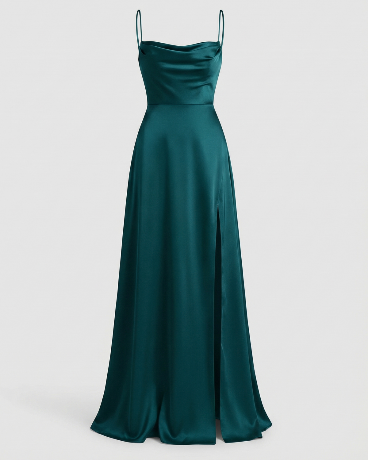 Maxi dress in deep teal satin with a cowl neckline, thin straps and a side thigh slit, shown front on. 5