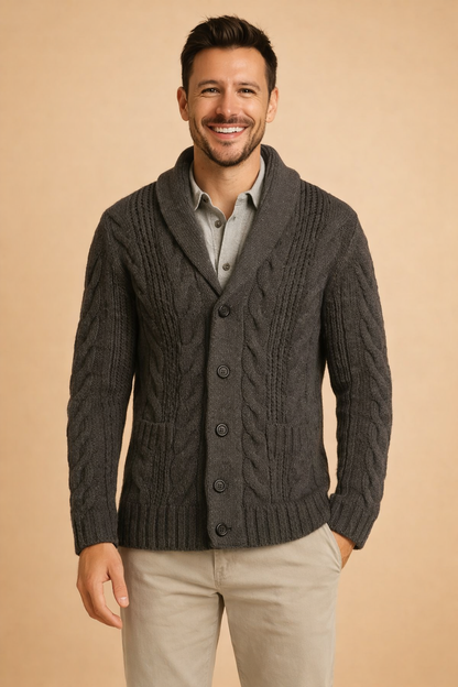 Front view of charcoal grey cardigan with two patch pockets, worn with beige trousers 5