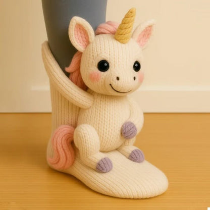 Cream sock with a unicorn figure with pink mane, golden horn and lilac hooves sitting on the ankle 13