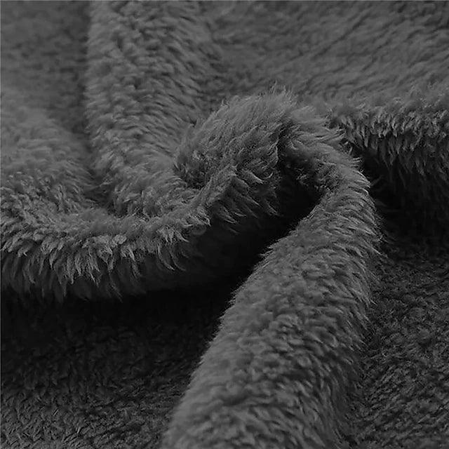 Close-up of the soft dark grey fleece lining, folded to show its dense, fluffy pile. 5