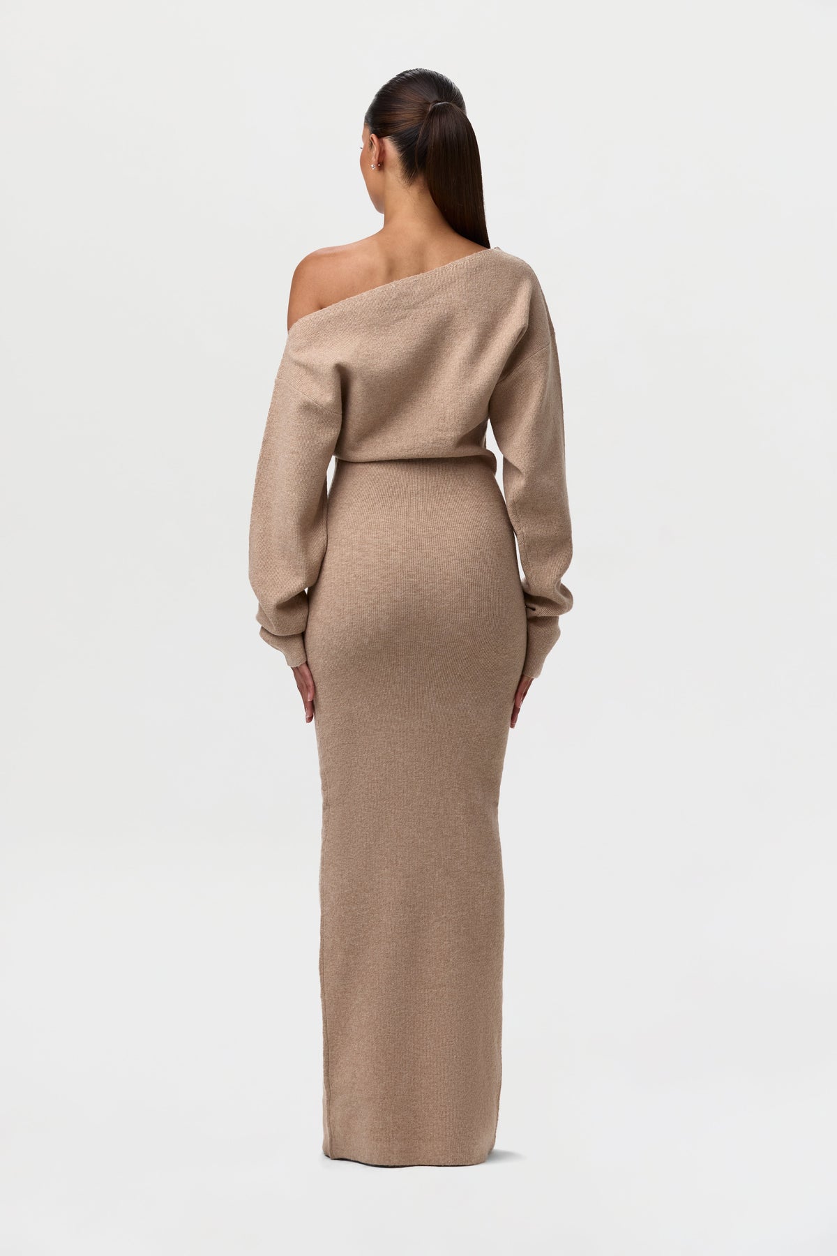 Back view of the camel knit maxi dress, showing the neckline, sleeves and fitted skirt. 17