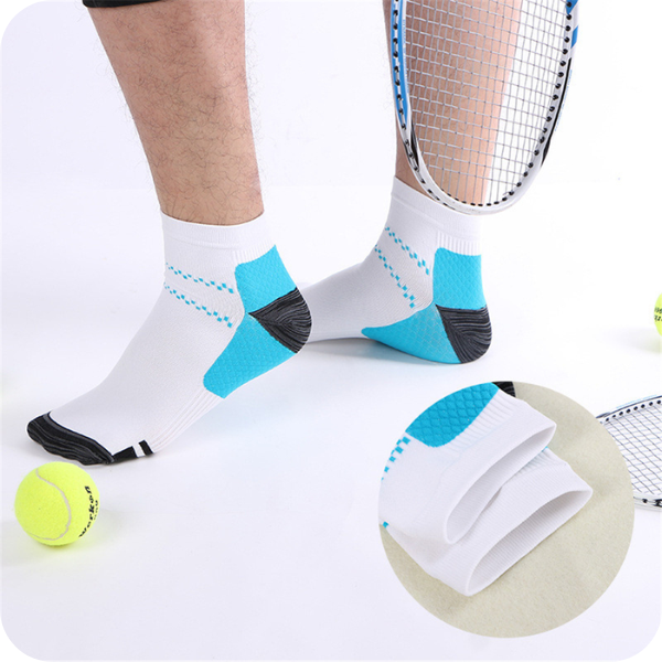 Man's feet in white ankle socks with blue heel panels, tennis racket and ball nearby, inset showing the folded cuff. 3