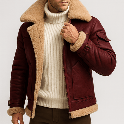 Model wearing the burgundy jacket with cream shearling collar, open over a white ribbed roll-neck jumper 1