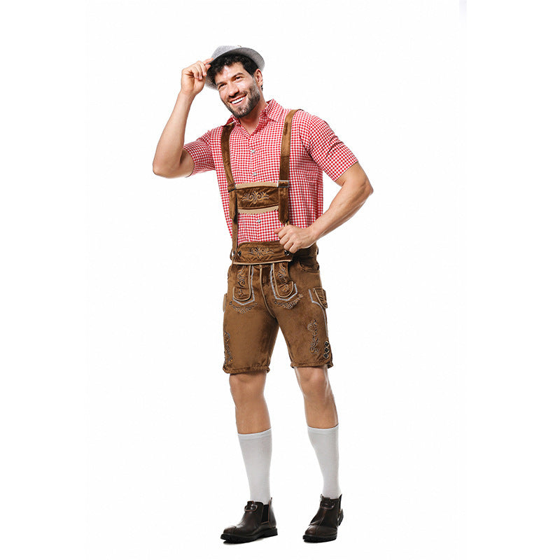 Smiling bearded model touching his grey hat, wearing red checked shirt, brown braced shorts, white knee socks and boots. 7