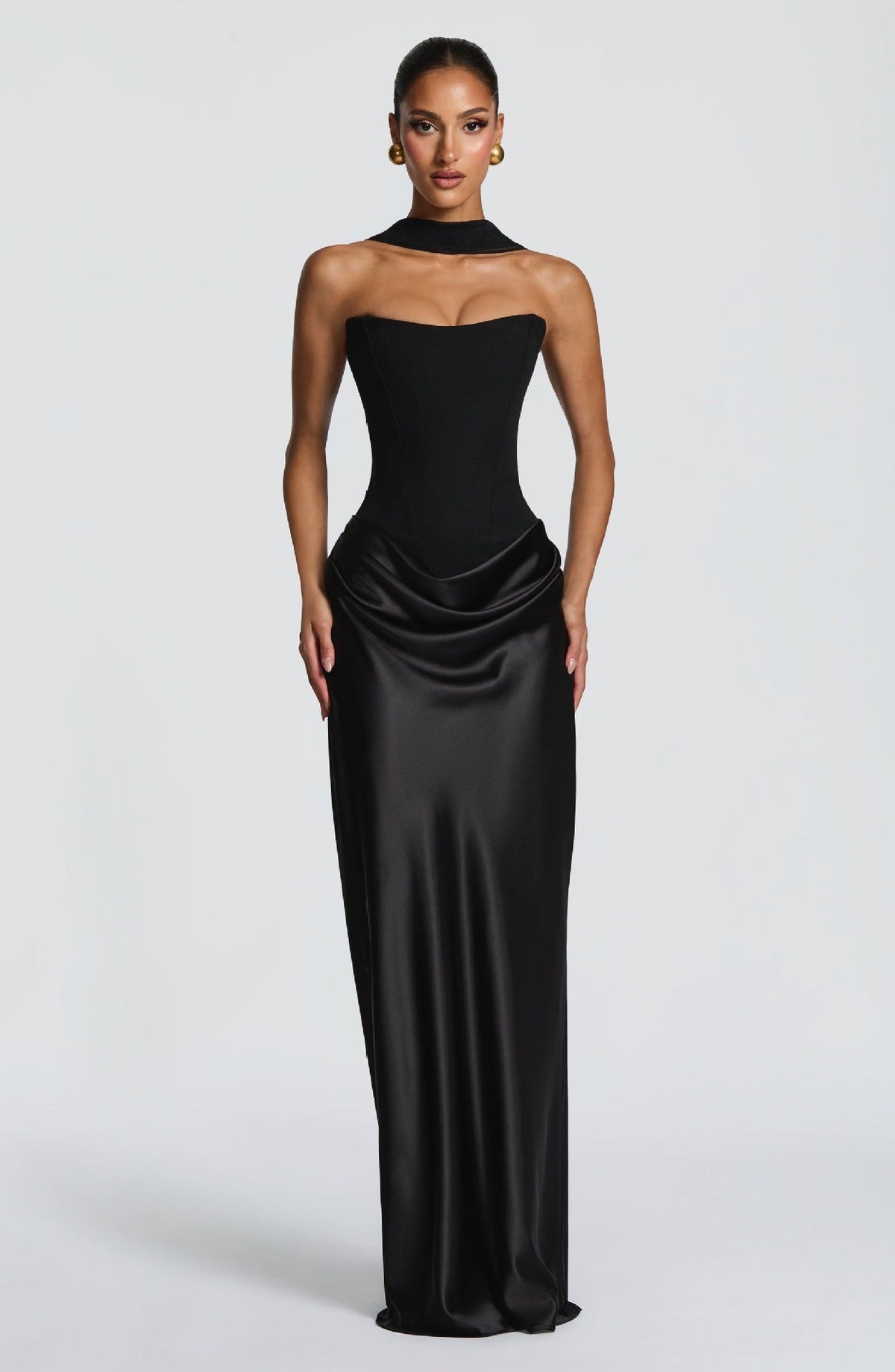 Front view of the black corset dress with draped choker neckline and gathered satin hip drape 24