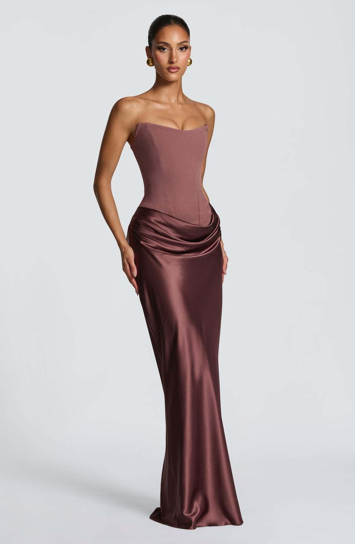Mocha rose strapless corset gown with hip drape and fishtail hem, shown at an angle 16