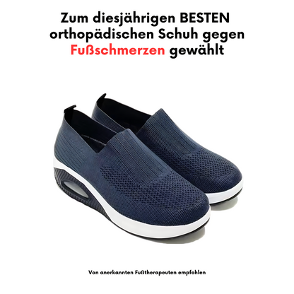 Pair of navy knit slip-on shoes with white sole and air cushion on a white background, under a promotional headline. 11