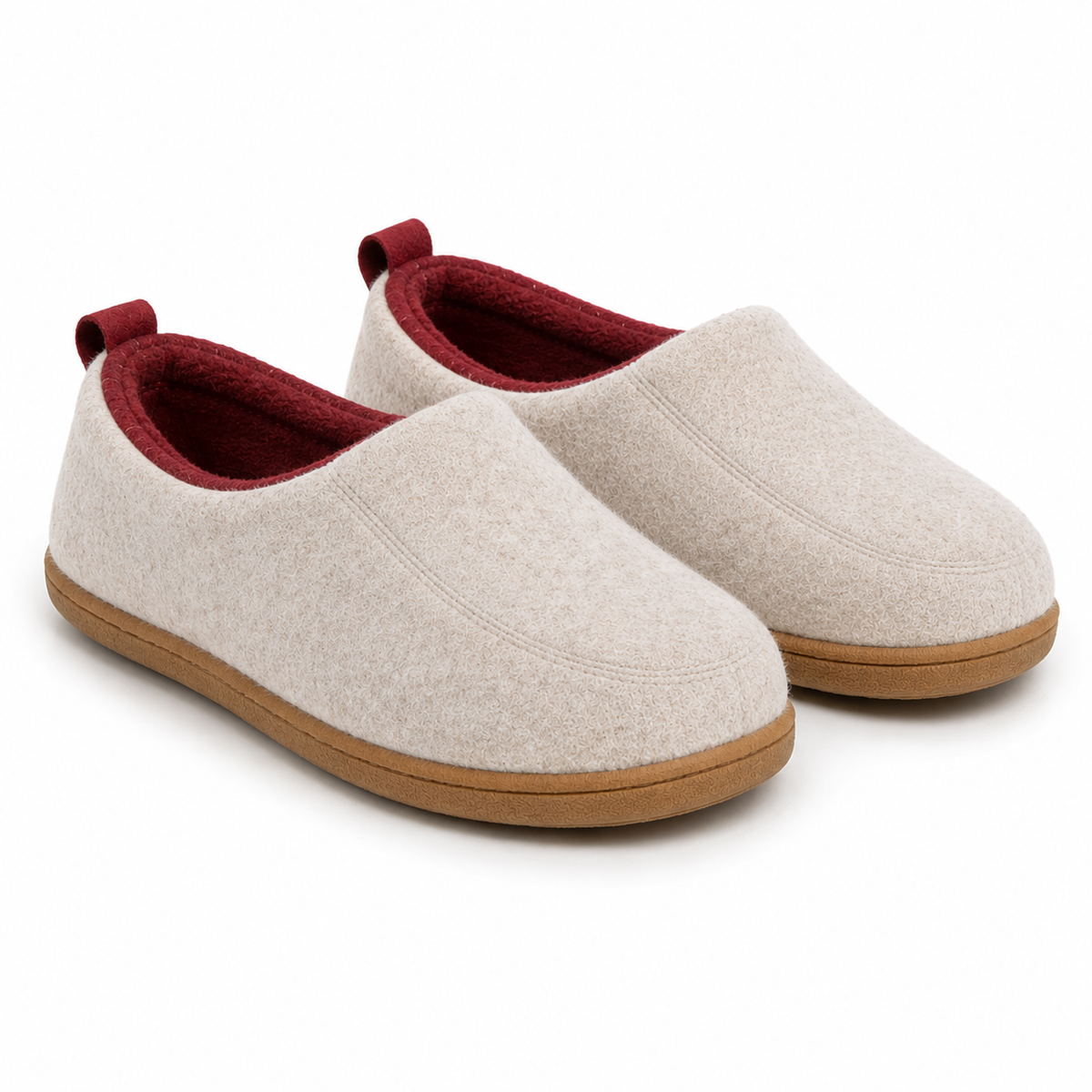 Pair of cream beige slippers from the front, with deep red lining, red heel loops and a tan hard sole. 7