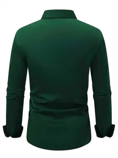 Back view of the dark green shirt laid out flat, showing the plain back, collar and long sleeves with cuffs. 11