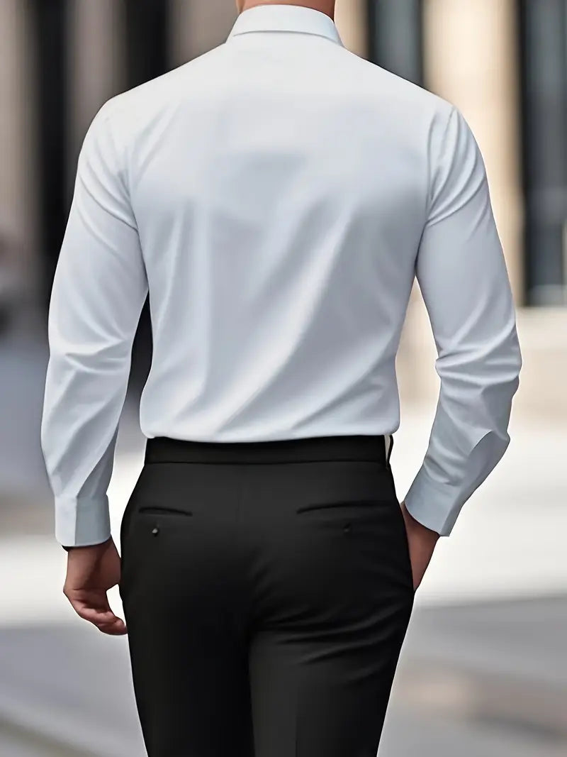 Back view of a model wearing the white shirt with black trousers, showing the smooth back and sleeves. 18