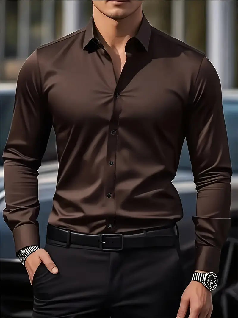 Close front view of the dark brown shirt with dark buttons, worn by a model with black trousers and belt. 4