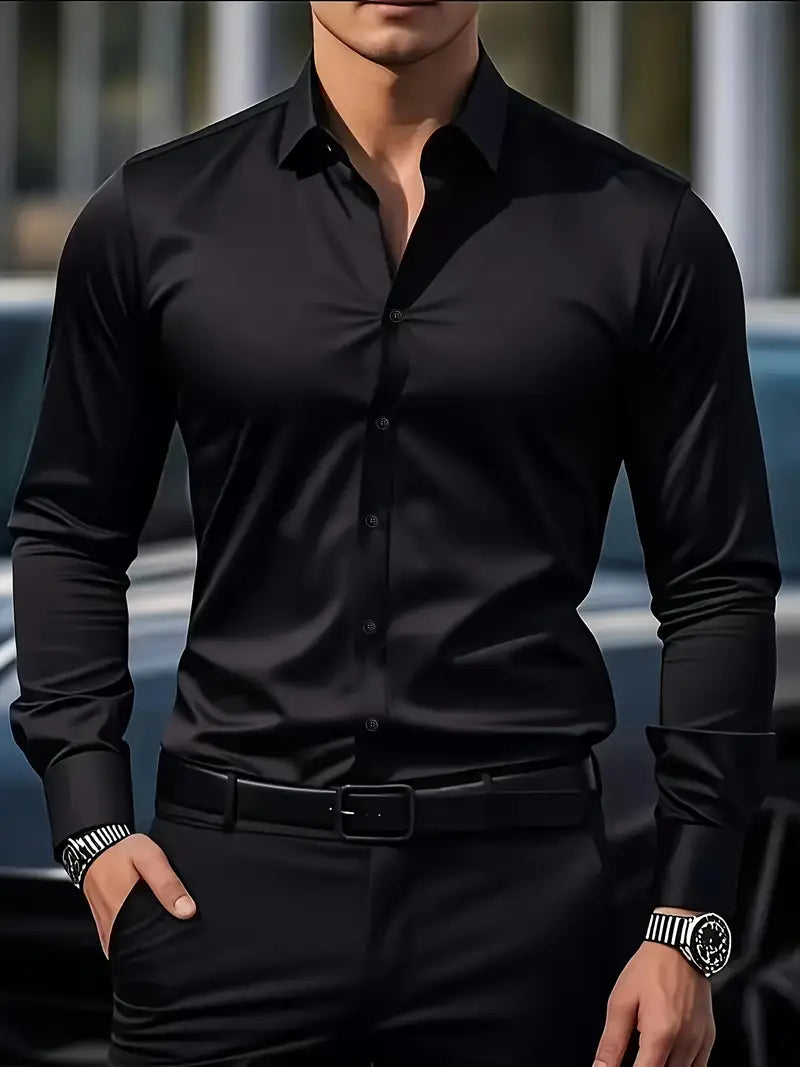 Close front view of the black long-sleeved shirt with matching buttons, worn by a model with black trousers and belt. 9