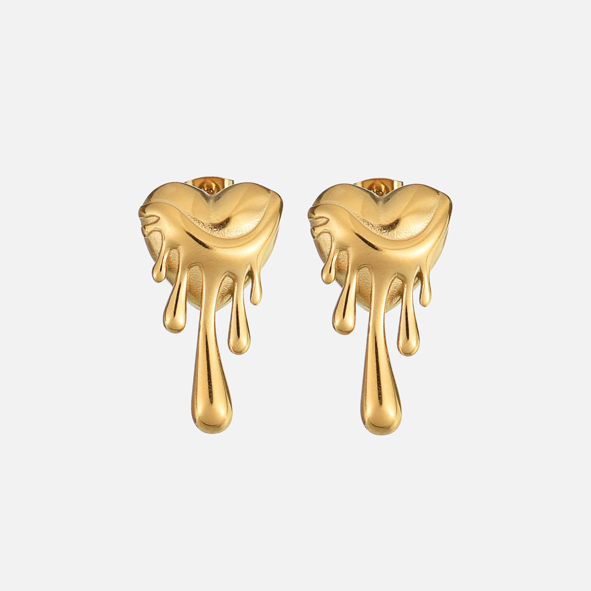 Pair of gold-tone dripping heart earrings seen from the front on a plain pale background 1