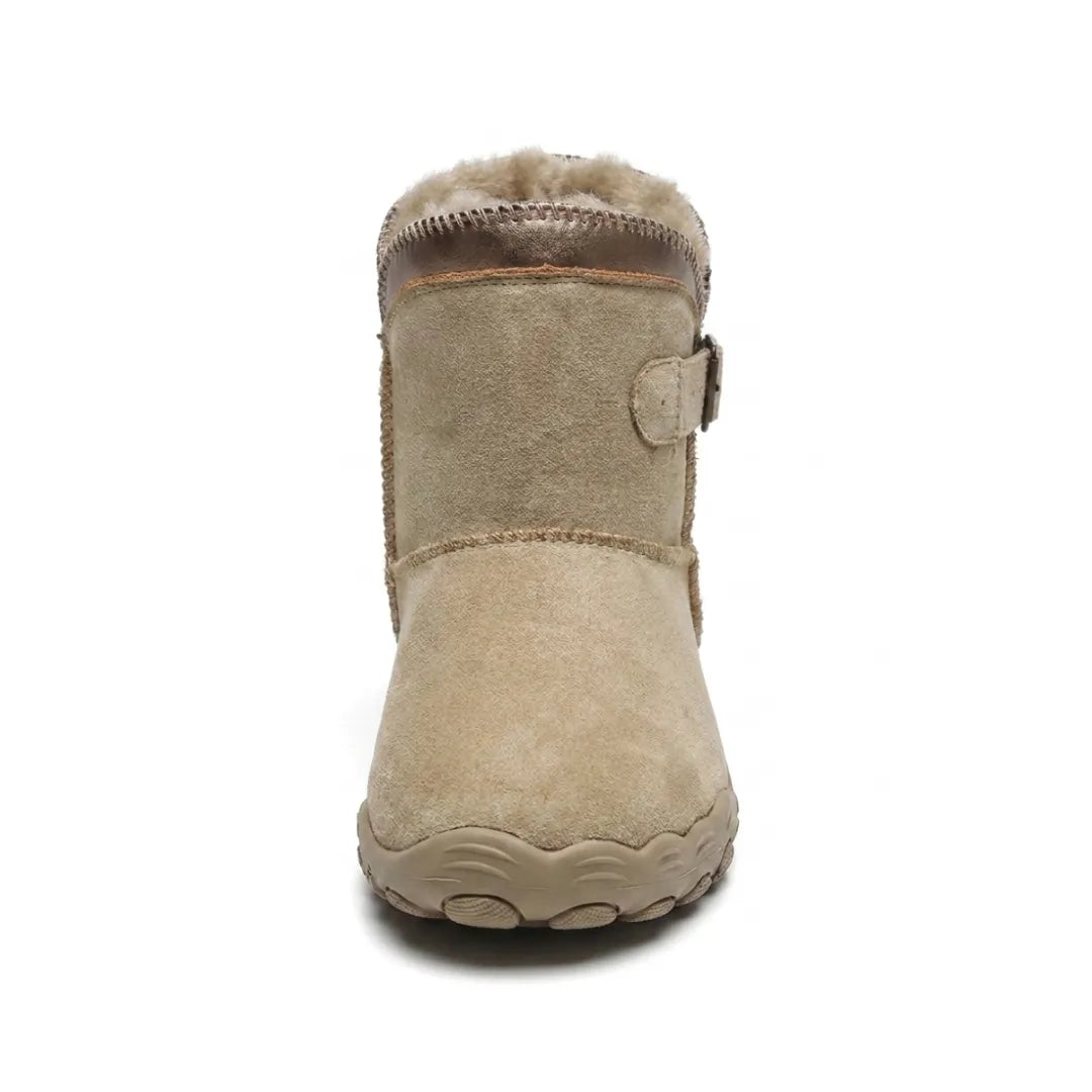 Front view of a beige boot showing the broad rounded toe and fleece collar 8