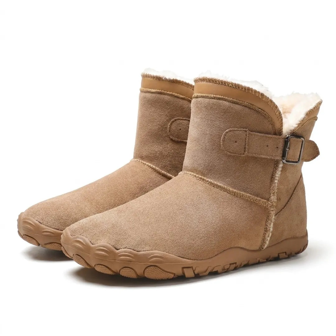 Pair of tan suede ankle boots with buckle straps, fleece lining and wide toe-shaped soles 25