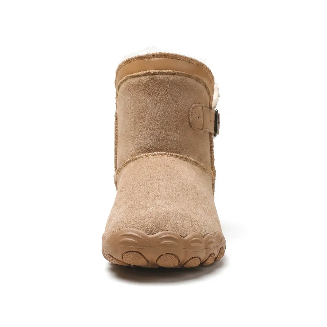 Front view of a tan suede boot showing the wide toe box and scalloped sole 26