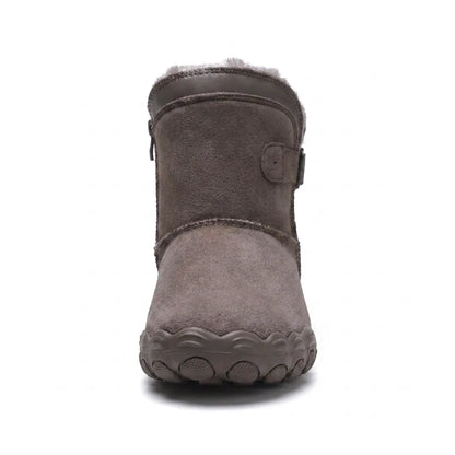Front view of a grey-brown suede ankle boot showing the wide toe box, buckle strap and fleece lining 44