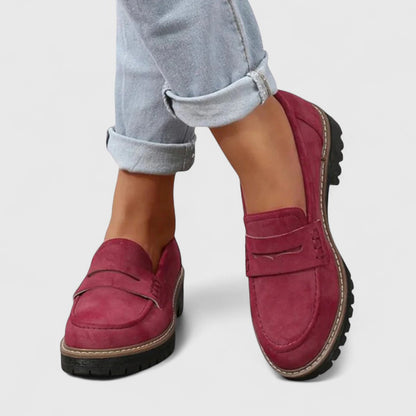 Burgundy suede-look loafers worn with light jeans turned up at the ankle 2